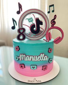 a birthday cake with music notes and a clock on top that reads'15 manuelella '