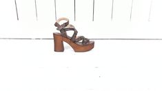 "Musse and Cloud open toe platform brown leather sandal/high heel strappy leather sandals/37 Measurements... - marked size: 37 - insole length: 9.25\" -width at ball: 3\" -heel: 3.75\" -front platform: 1.5\" Features... -genuine leather -high platform -4 adjustable straps -wooden/resin platform Condition... -excellent condition -gently worn...minimal wear DC2*" Brown Chunky Platform Sandals For Party, Brown Leather Chunky Platform Sandals, Brown High Heel Sandals With Chunky Platform, Brown Ankle Strap Sandals With Chunky Platform, Brown Chunky Platform Sandals With Ankle Strap, Brown Chunky Platform High Heel Sandals, Leather Strappy Platform Heels, Strappy Leather Platform Heels, Brown Chunky Platform Heels With Open Toe