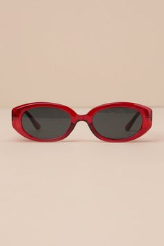 Throw on the Lulus Chic Gaze Red Oval Sunglasses and step out knowing you're the coolest babe around! Clear red acetate shapes these cute, 90s-inspired sunglasses that have oval-shaped frames that support stylish, dark-tinted lenses. Pair with low-rise denim and strappy sandals for a look that's ready to hit the city! Frames Measures 5. 75" Wide. Arms Measures 5. 75" Long. 100% Plastic. Imported. Lulus | Chic Gaze Red Oval Sunglasses. Trendy Red Sunglasses With Polarized Lenses, Modern Red Plastic Sunglasses, Casual Red Plastic Sunglasses, Retro Red Sunglasses With Tinted Lenses, Red Glass Sunglasses With Uv Protection, Retro Red Sunglasses With Uva Protection, Red Plastic Sunglasses With Uva Protection, Red Sunglasses With Mirrored Lenses, Red Retro Sunglasses For The Beach