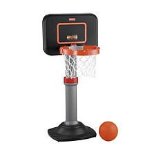 an orange basketball is in front of a black and silver portable basketball hoop with the net attached to it