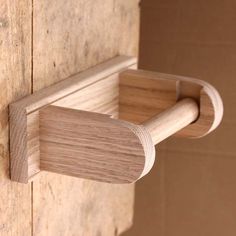 a close up of a wooden handle on a door