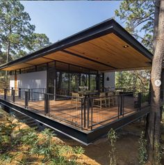 a house in the middle of some trees