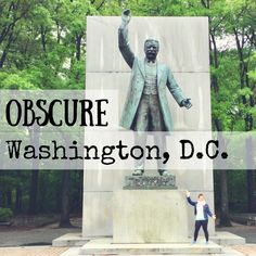 a person standing in front of a statue with the words obscure washington, d c