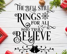 the bible verse is surrounded by christmas decorations and presents on a white wooden table with red ribbon