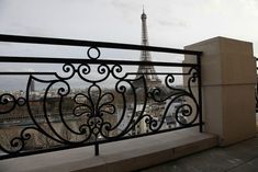 a balcony overlooking the eiffel tower in paris