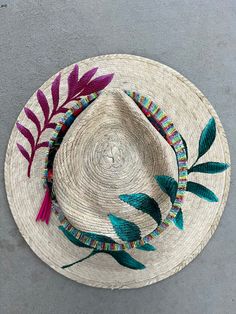 This hat is made of painted straw jute, hand painted with fabric paints and sealed to protect from weather. Perfect addition to your summer wardrobe.   If you'd like completely custom design on a hat please go to this link to order one made just for you! https://etsy.me/3rod0CN I also have some floral stickers. https://etsy.me/3RlfSuE You may also enjoy this floral ball cap. https://etsy.me/3fyBaHQ 💜 H A T   S I Z I N G   Tightening band inside. Hat Circumference: 20-23" Brim Width: 3.5" Extra Leaf Hat, Hat Bar, Statement Hat, Colorful Hat, Rancher Hat, Festival Hat, Floral Stickers, Bar Ideas, Boho Festival