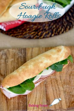 a sub sandwich with lettuce and cheese on it sitting on a wooden table