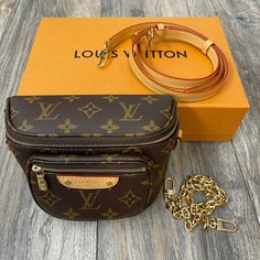 Louis Vuitton Monogram Mini Bum Bag Brand New With Box Monogram Canvas Belt Bag With Detachable Strap, Brown Monogram Canvas Crossbody Belt Bag, Luxury Monogram Canvas Belt Bag With Detachable Strap, Travel Belt Bag In Monogram Canvas With Dust Bag, Monogram Canvas Crossbody Belt Bag For Travel, Travel Belt Bag With Removable Monogram Canvas Pouch, Luxury Monogram Canvas Belt Bag With Gold-tone Hardware, Luxury Monogram Canvas Rectangular Belt Bag, Monogram Canvas Belt Bag With Removable Pouch