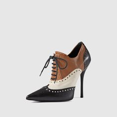 Step into timeless elegance with our Vintage Tricolor pointed-toe Brogue Inspired Lace Up Oxford Heels. Classic design meets modern flair, making these heels a sophisticated addition to any wardrobe. Color: Black, white and brown Heel Type: Stiletto heel Heel height: 4.72'' / 120 mm approx Product measurements were taken using size 8. Please note that measurements may vary by size. Toe: Pointed toe No platform Vintage brogue-inspired design Handcrafted US sizing. Fits true to size. Stiletto Heel Boots, Shoes Oxford, Wingtip Shoes, Shoes Gucci, Shoes Retro, Strappy Shoes, Leather Brogues, Oxford Heels, Suede Boots Knee High