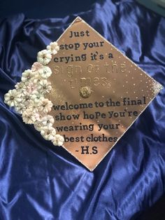 a graduation cap with flowers on it that says, just stop your crying it's a special occasion