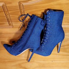 A Dramatic Nod-To-The-80s Bombshell Heel With A Victorian Granny Boot Vibe. Nwot With No Flaws. Medium Dark Blue Denim. Sleek And Ankle Hugging. Working Laces Provide A Customized Fit, Easy On/Off Inside Zipper And A Slightly Padded Collar For Comfort. Perfect With A High-Low Skirt Or High Waist Jeans And A Blazer. They Look Just As Great With Knit Boot Toppers As A Bare Leg...Orrrr, You Can Rock Them With The Super Foxy Split Leg Navy Jumpsuit Right Over There... Offers & Bundles Welcome... Ankle-high Fitted Casual Heels, Fitted Ankle-high Casual Heels, Casual Ankle-high Fitted Heels, Fitted Denim Heels For Fall, Casual Denim Blue Pointed Toe Heels, Denim Blue Fitted Heels With Round Toe, Summer High Heel Denim Blue Boots, Summer Denim Boots With Pointed Toe, Blue Lace-up Casual Heels