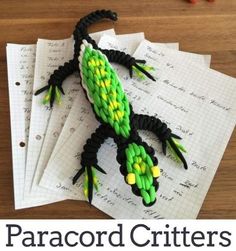 an image of a lizard made from paracord critters on top of paper