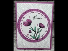 a thank card with purple flowers on it