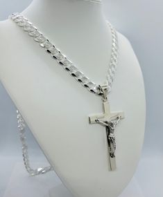 "925 Sterling Silver Men's chain with large crucifix This necklace is made with real 925 Sterling silver. The chain is 11mm in width and is made very solid. The cross is polished finish and is 2\" x 3 1/2 \" including the loop. The chain and charm is approximately 197 grams in 36\". The chain can be ordered in 30\", 36\" or 40\". The chain can be made custom in any length. Both the charm and chain is stamped for metal authenticity. Great for priests or just to give a statement. Comes in a box" Silver Cross Chain For Men, Emma Myers, Silver Chain For Men, Catholic Jewelry, Necklace Men, Cross Chain, Silver Chains, Silver Anklets, Sterling Silver Mens