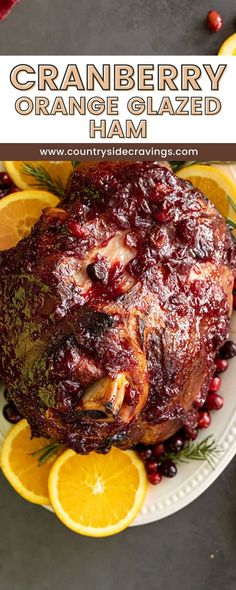 cranberry orange glazed ham on a white plate