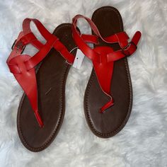 Never Worn Sandals. Size 11. Red Synthetic Sandals With Ankle Strap, Red Leather Flip Flops For Vacation, Red T-strap Sandals With Round Toe For Summer, Red Leather Flip Flops For Summer, Red Sandals With Buckle Closure For Summer, Red Buckle Closure Sandals For Summer, Red Sandals With Buckle Closure For Spring, Red Sandals With Single Toe Strap For Beach, Red Beach Sandals With Single Toe Strap