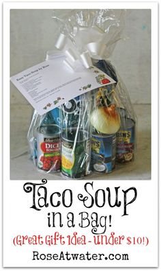 a bag filled with food sitting on top of a table next to a sign that says, taco soup in a bag great gift idea - under $ 10