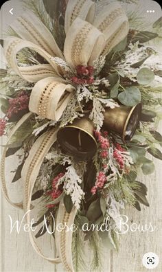 a christmas wreath with bells and greenery on it that says we merry and bows