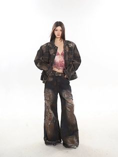 These vintage destroyed grunge jeans feature a relaxed bootcut flare and a rust paint distressed wash. The ripped and shredded detail adds a touch of edginess to your look. Relaxed bootcut flare Vintage grunge-inspired style Rusty, worn-in distressed wash Tattered rips with shredded accents Model is 5'4 95lbs wearing M Grunge Distressed Cotton Denim Jacket, Distressed Fitted Grunge Denim Jacket, Grunge Distressed Dark Wash Outerwear, Distressed Denim Grunge Pants, Faded Distressed Grunge Jeans, Grunge Jeans, Rust Paint, Gold G, Vintage Grunge