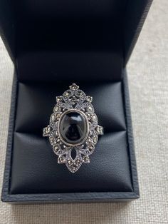 Sterling Silver onyx Marcasite ring Beautiful art deco style  Rhodium finish  Ring face Approx 28 x 18mm Brand new Supplied with ring box Art Deco Silver Signet Ring With Polished Finish, Silver Art Deco Signet Ring With Polished Finish, Formal Silver Signet Ring With Cabochon, Art Deco Silver Signet Ring, Silver Art Deco Signet Ring, Formal Antique Silver Hallmarked Ring, Collectible Oval Ring With Black Enamel, Silver Filigree Ring With Stone Setting For Formal Occasions, Silver Filigree Ring For Formal Occasion