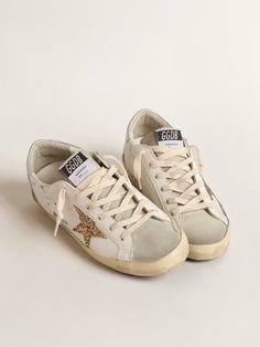 Super-Star with gold glitter star and ice-gray suede inserts | Golden Goose Golden Goose Women, Golden Family, Gold Glitter Stars, Shoe Inspo, Golden Goose Shoes, Glitter Stars, Super Star, Gray Suede, Golden Goose