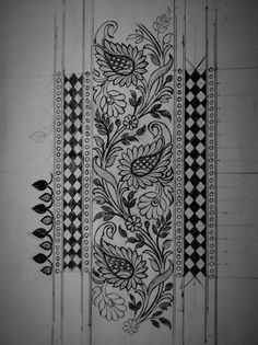 an intricately designed wallpaper with black and white designs on the side of it