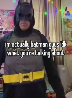 a man dressed up as batman with the caption i'm actually batman guys talk what you're talking about