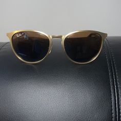 Ray Ban Sunglasses Black/Gold Only Worn A Few Times W / Case Gold Rayban Sunglasses, Ray Ban Justin Sunglasses, Ray Ban Beat Sunglasses, Black Sunglasses Ray Bans, Ray Ban 3447, Colored Sunglasses, Ray Ban Sunglasses, Ray Ban, Sunglasses Accessories