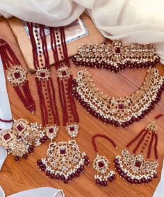 Prepare yourself for wedding season which is around the corner! Be happy while creating your royal looks and be on top of your style game in a room full of people. This bridal set is an example of perfection with extraordinary touch for someone beautiful like you!  Beautifully crafted in Hyderabadi ruby stones and gold plating for a royal look on your big day! Set included: necklace, choker , earrings , mang tikka , jhumar, mala , bracelet. In stock and ready to ship. color : maroon gold  Hand c Full Bridal Jewellery Set, Hyderabadi Jewelry, Mang Tikka, Earrings Kundan, Bridal Jewelry Sets Brides, Perhiasan India, Indian Bridal Jewelry Sets, Kundan Jewelry, Gold Jewelry Simple Necklace