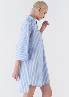 Details: Pullover Style Collared V Neckline 3/4 Length Sleeve Oversized Fit Mini Length Shirttail Hemline 70% Cotton, 26% Polyamide, 4% Elastane Made in Italy Oversized Shirt Dress, Semi Annual Sale, V Neckline, 50's Dress, Oversized Shirt, Oversized Fits, Pullover Styling, White Stripe, Classic Style