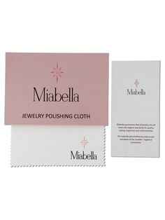 a pink and white business card with the name mimbabella jewelry polishing cloth