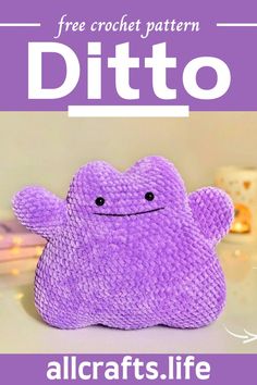 a purple stuffed animal sitting on top of a table next to a white plate with text overlay reading free crochet pattern ditto