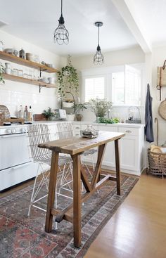 the kitchen is clean and ready to be used as a dining room or breakfast nook