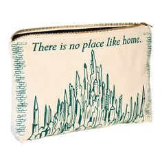 there is no place like home zippered pouch with cityscape on the front