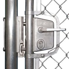 a close up view of a metal gate with a lock on the front and side