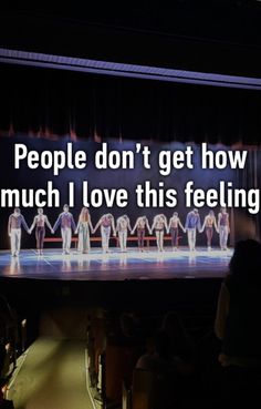 people are standing on a stage with the words people don't get how much i love this feeling