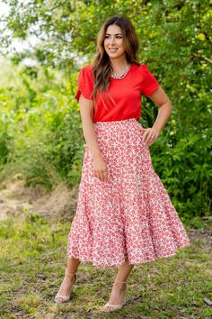 We cannot get over how stylish this skirt is! The beautiful floral print and tiered style fit makes such a cute, elegant look! Wear this skirt to any event and you are sure to receive compliments! We love tucking a blouse into this for a more elevated look or a basic or graphic tee for a casual feel! Self: 100% PolyesterLining: 100% Rayon Hand wash cold. Do not bleach. Lay flat to dry. Low iron if necessary. Kimono Blouse, Tiered Midi Skirt, Romper And Jacket, Guest Attire, Wedding Attire Guest, Red S, Long Sleeve Short Dress, Loungewear Sets, Low Iron