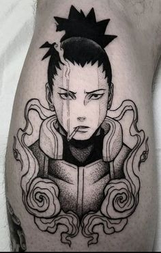 a man's leg with a tattoo on it that has an image of the character naruta