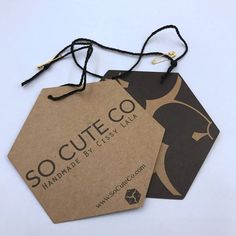 two tags that say souteeco and handmade by eless milla