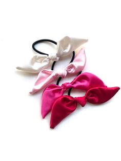 GRAB BAG TIME! MYSTERY Set of 3 bow hair ties featuring variable colors. Over 50 variations available! Comes with standard hair elastics.   Q: I am buying it for a friend as a gift can you mail it to them directly?  A: Yes! Be sure to include your friend's shipping address and we will put in a personalized message from you in the gift wrapping. ♥ Love it but want to buy it later? Simply add this item to your favorites list. ♥FREE Combined shipping with the purchase of more than 1 item! *Check out more fun headbands, dolly bows, bows, and accessories:  www.jocelovely.etsy.com Pink Hair Tie, Pony Tail Hair, Gift Bachelorette Party, Bachelorette Party Favor, Tail Hair, Tie Gifts, Etsy Bridesmaid Gifts, Favorites List, Bachelorette Party Favors