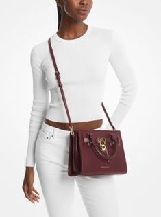 Crafted from timeless leather, this updated take on the iconic Hamilton satchel features a belted silhouette accented with a polished padlock charm. Complete with a crossbody strap and an organized interior, it’s the statement bag your closet is craving. Designer Satchel With Turn-lock Closure For Work, Chic Satchel With Metal Hardware For Fall, Chic Fall Satchel With Metal Hardware, Formal Bags With Branded Hardware For Fall, Classic Satchel With Turn-lock Closure For Shopping, Elegant Bags With Metal Hardware For Fall, Elegant Fall Bags With Metal Hardware, Elegant Fall Bags With Branded Hardware, Designer Satchel With Silver-tone Hardware For Work