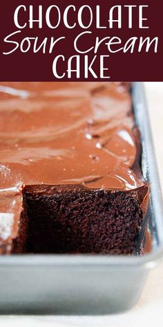 chocolate sour cream cake in a pan with text overlay