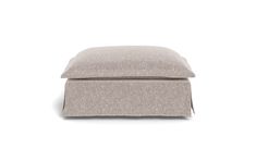 a light gray ottoman cushion on a white background