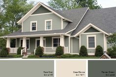 a house with gray paint and white trim