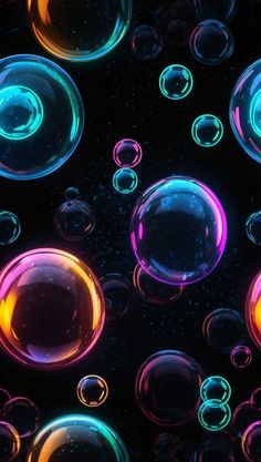 soap bubbles floating in the air on a black background with multicolored circles around them