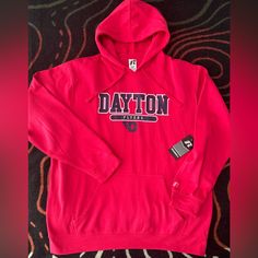 (Nwt) Dayton Flyers Team Hoodie. (Russell) Xl Red Hoodie. Brand New. Great For The Dayton Flyer Fan! Super Cozy!Logo On The Front With Team Logo.Ready To Represent! Red Sweatshirt For Game Day In Winter, University Red Cotton Hoodie For Fall, Red Winter Hoodie For Fan Apparel, Red Winter Hoodie For Fan Gear, University Red Collegiate Cotton Hoodie, University Red Cotton Collegiate Hoodie, University Red Cotton Hoodie For Sports, Red Hoodie For Fall Fan Gear, Red Sweatshirt For Fan Gear In Winter