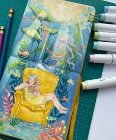 a drawing of a woman sitting on a yellow chair next to crayons and markers