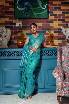 Fabric : Banarasi Silk Color : Arctic Blue Length : 5.5 Meter Saree + 0.80 Meter Blouse Pattern : Zari Woven Design Border : Zari Woven Border Wash : Dry Clean Only Product color may little differ as per the brightness or color settings of your device. Sky Blue Banarasi Saree, Blue Banarasi Silk Handloom Sets, Light Blue Banarasi Saree, Bollywood Blue Banarasi Silk Pre-draped Saree, Elegant Blue Banarasi Silk Pre-draped Saree, Indian Fashion Saree, Arctic Blue, Saree Dress, Blouse Pattern