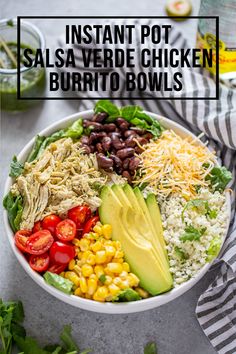 a bowl filled with chicken, beans, avocado and rice