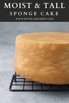 a cake sitting on top of a cooling rack with the words, moist & tall sponge cake